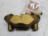 Brake caliper left front Triumph Tiger 1050