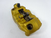 Brake caliper left front Triumph Tiger 1050