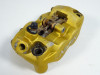 Brake caliper left front Triumph Tiger 1050