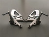 Footrest left Aprilia RSV 1000