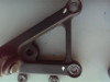 Footrest left Aprilia Tuono 1000