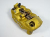 Brake caliper left front Triumph Tiger 1050