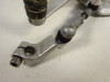 Main step holder left Triumph Tiger 1050