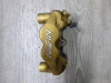 Brake caliper left front Triumph Tiger 1050