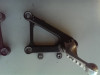 Footrest left Aprilia Tuono 1000