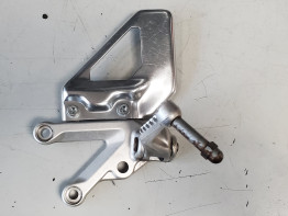 Footrest left Aprilia Tuono 1000