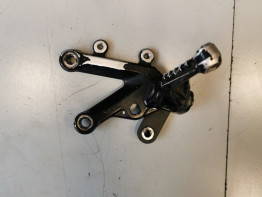 Footrest left Aprilia RSV 1000