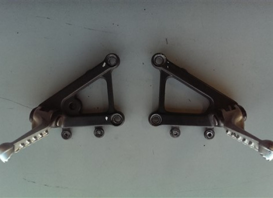 Footrest left Aprilia Tuono 1000