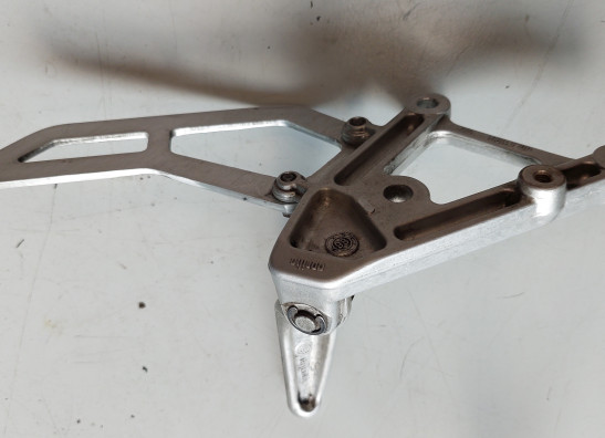 Footrest left Aprilia RSV 1000