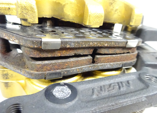 Brake caliper left front Triumph Street Triple 675