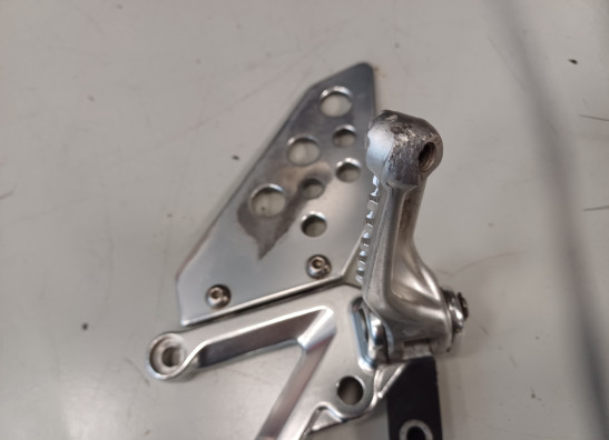 Voetsteun links Aprilia Tuono 1000
