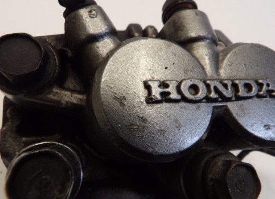 Brake caliper left front Honda VT 700 750