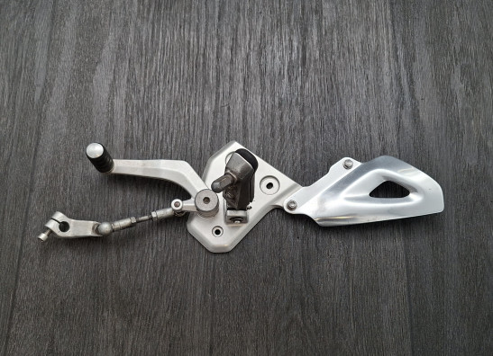 Main step holder left Triumph Tiger 1050