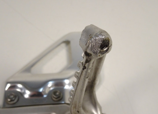 Main step holder left Aprilia Tuono 1000