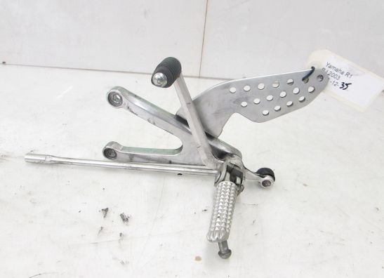 Main step holder left Yamaha YZF R1