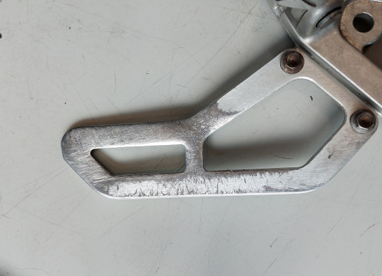 Footrest left Aprilia RSV 1000