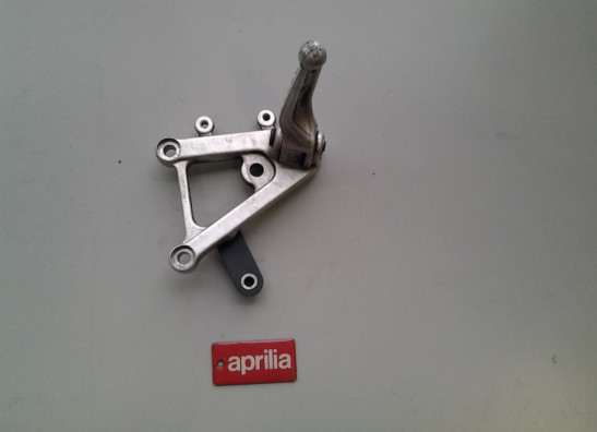 Footrest left Aprilia RSV 1000