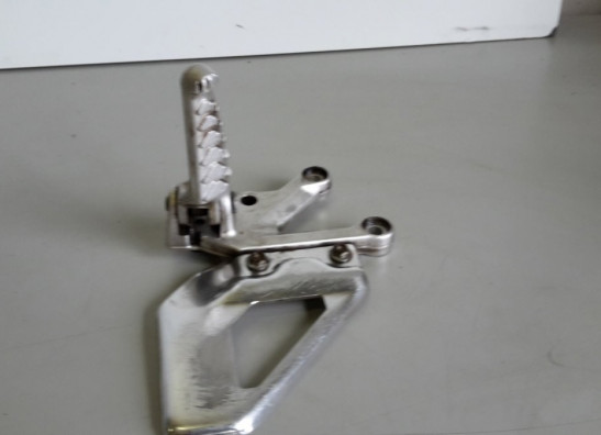 Footrest left Aprilia RSV 1000